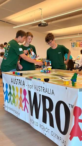 Kids building a robot together